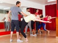 Young adults dancing in a studio Royalty Free Stock Photo