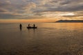 Young adults enjoying a mokoro boat ride at the shores of Lake Malawi