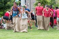 Young Adults Participate In Sack Race At Atlanta Field Day