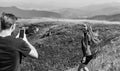 Young adventurers. Couple taking photo. Couple in love hiking mountains. Lets take photo. Capturing beauty. Man and Royalty Free Stock Photo