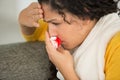 Young afraid woman with bloody nose