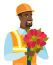 Young african-american builder with bouquet.