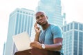 Young African American Businessman with afro short hair, traveling, working in New York Royalty Free Stock Photo