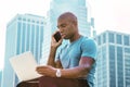 Young African American Businessman with afro short hair, traveling, working in New York Royalty Free Stock Photo