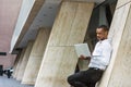 Young African American businessman with beard working in New York Royalty Free Stock Photo