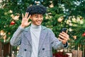 Young african american businessman doing video call using smartphone at the park Royalty Free Stock Photo