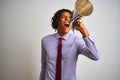 Young african american businessman screaming using vintage megaphone Royalty Free Stock Photo