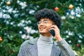 Young african american businessman smiling happy talking on the smartphone at the park Royalty Free Stock Photo