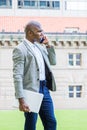 Young African American Businessman talking on cell phone, traveling, working in New York City Royalty Free Stock Photo