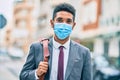 Young african american businessman wearing medical mask at the city Royalty Free Stock Photo