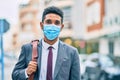 Young african american businessman wearing medical mask at the city Royalty Free Stock Photo