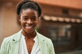 Young african american businesswoman smiling happy standing at the city Royalty Free Stock Photo