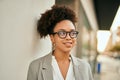 Young african american businesswoman smiling happy standing at the city Royalty Free Stock Photo