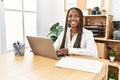 Young african american businesswoman smiling happy working at the office Royalty Free Stock Photo