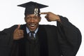 Young African American college graduate with tuition debt price tag, horizontal