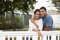 Young African American couple embrace outside their house Royalty Free Stock Photo