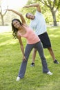 Young African American Couple Exercising In Park Royalty Free Stock Photo