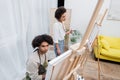 Young african american couple looking at