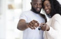 Young African American couple showing keys to their own home Royalty Free Stock Photo