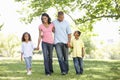 Young African American Family Enjoying Walk In Park Royalty Free Stock Photo