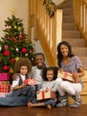 Young African American family with gifts Royalty Free Stock Photo