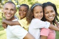 Young African American Family Relaxing In Park Royalty Free Stock Photo