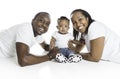 Young African American family in the studio with baby toddler son