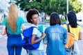 Young african american female student with group of friends Royalty Free Stock Photo