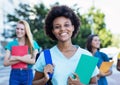 Young african american female student with group of women Royalty Free Stock Photo