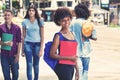 Young african american female student waiting for bus Royalty Free Stock Photo