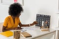 young african american freelancer checking calendar at workplace Royalty Free Stock Photo