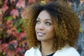 Young African American girl with afro hairstyle and green eyes Royalty Free Stock Photo