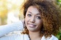 Young African American girl with afro hairstyle and green eyes Royalty Free Stock Photo