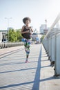 Young african american girl running. Royalty Free Stock Photo