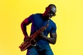 Young african-american jazz musician playing the saxophone Royalty Free Stock Photo