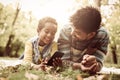 Young African American little girl and her father lying down in Royalty Free Stock Photo