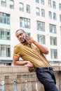 Young African American Man with beard talking on cell phone in New York City Royalty Free Stock Photo