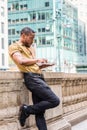 Young African American Man with beard working in New York City Royalty Free Stock Photo