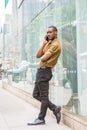 Young African American Man calling on cell phone on street in Ne Royalty Free Stock Photo