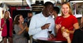 Young african american man flirting with girl on party