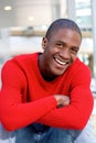 Young african american man laughing with crossed arms Royalty Free Stock Photo