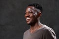 Young african american man laughing and looking away Royalty Free Stock Photo