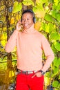 Young African American Man listening Music in Central Park, New