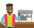 Young african-american man making coffee.
