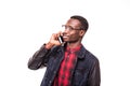 Young African American man making a phone call on her smartphone on white Royalty Free Stock Photo