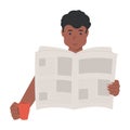 Young African American man reading a newspaper Royalty Free Stock Photo