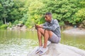 Young African American Man relaxing at Central Park in New York Royalty Free Stock Photo