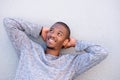 Young african american man smiling with hands behind head Royalty Free Stock Photo