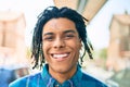 Young african american man smiling happy looking to the camera at street of city Royalty Free Stock Photo