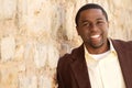 Young African American man smiling outside. Royalty Free Stock Photo